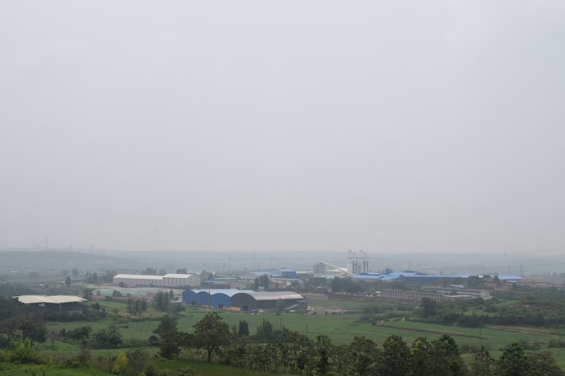 Factory exterior β processing plant wing