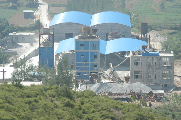Surrounded by green hills — environmentally managed operation